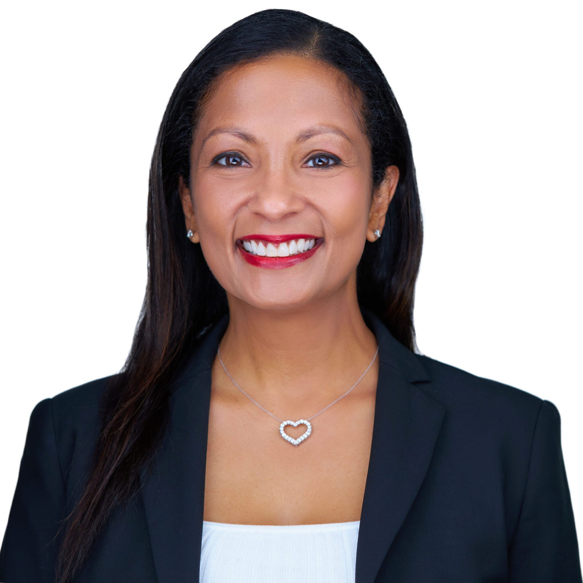 TashaCunningham_ProfileHeadshot-2 A woman in a black jacket and white shirt